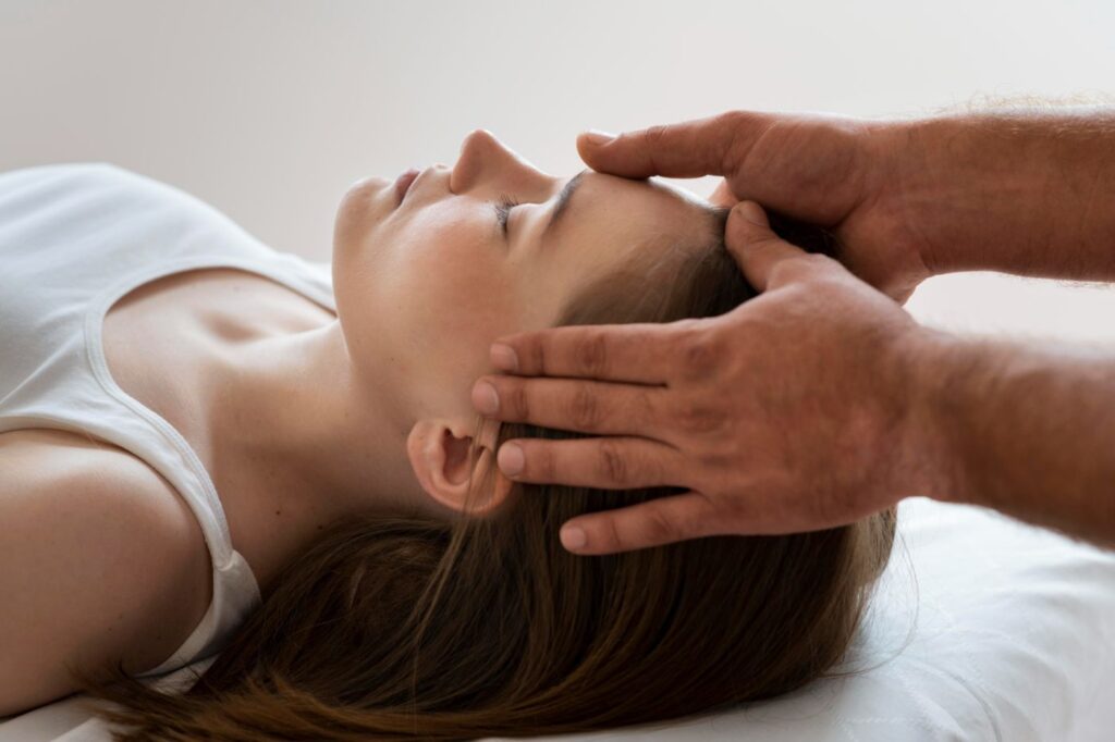 Osteopathy patient getting treatment massage.